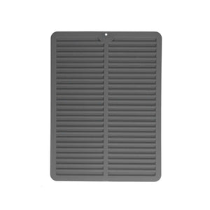 Dish Drying Mat in charcoal grey silicone, with a rectangular shape, raised drainage ribs, and a small hanging hole