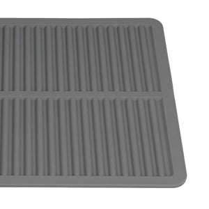 Dish Drying Mat in dark gray silicone with a ribbed drainage surface, divided into two sections and raised edges