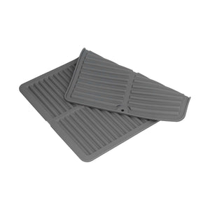 Dish Drying Mat in dark gray silicone with raised ridges, wide edges and a rolled, layered design