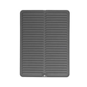 Dish Drying Mat in dark grey silicone with raised parallel drainage ridges and a small hanging hole