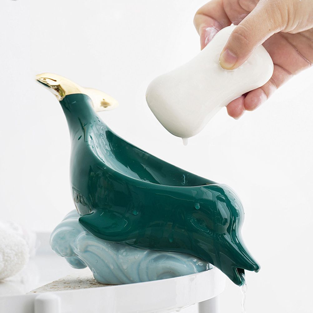 Dolphin Ceramic Soap Box with glossy teal ceramic dolphin-shaped holder, pale blue wave base and gold accents