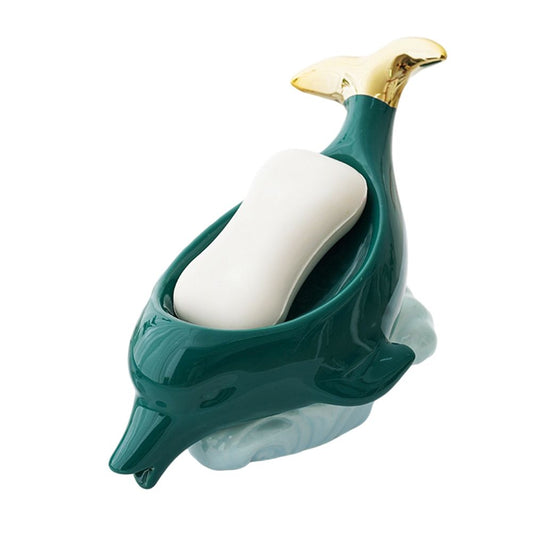 Dolphin Ceramic Soap Box in glossy teal ceramic, sculpted dolphin holding a white soap bar with a gold-toned tail