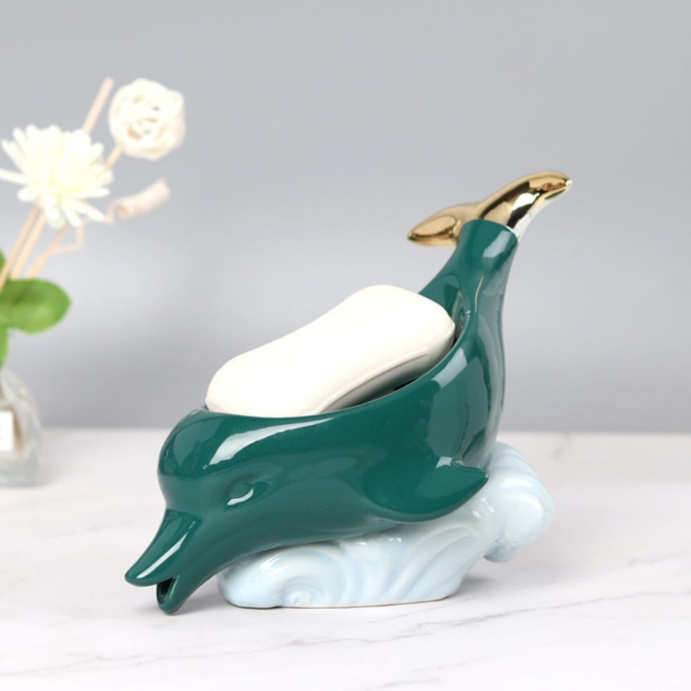 Dolphin Ceramic Soap Box in glossy teal and white ceramic, shaped as a leaping dolphin with gold accents and a soap bar