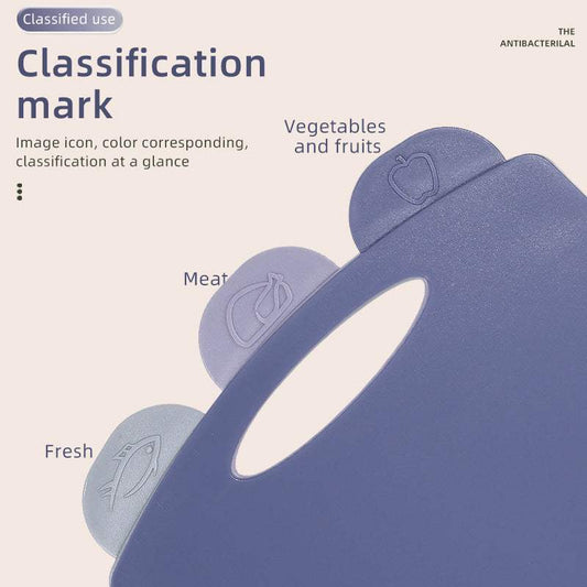 Double-Sided Antibacterial Kitchen Chopping Board Set with a blue-grey plastic board and raised food-category tabs for vegetables, meat and fish
