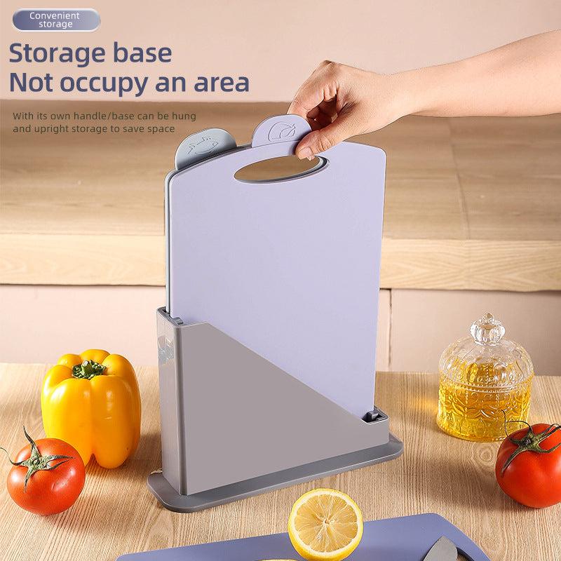 Double-Sided Antibacterial Kitchen Chopping Board Set with three pastel grey boards, food icons and a storage stand