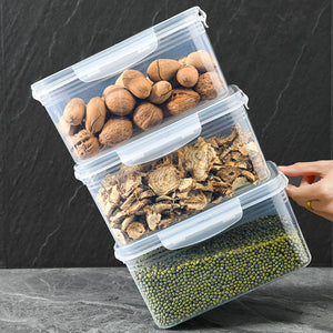Drain Storage Basket Box with clear plastic rectangular containers, translucent lids and white clasps, stacked with assorted dry foods