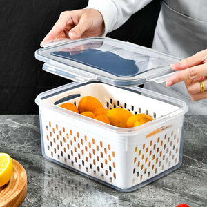 Drain Storage Basket Box in white perforated plastic with a clear lid, holding oranges in a removable draining basket