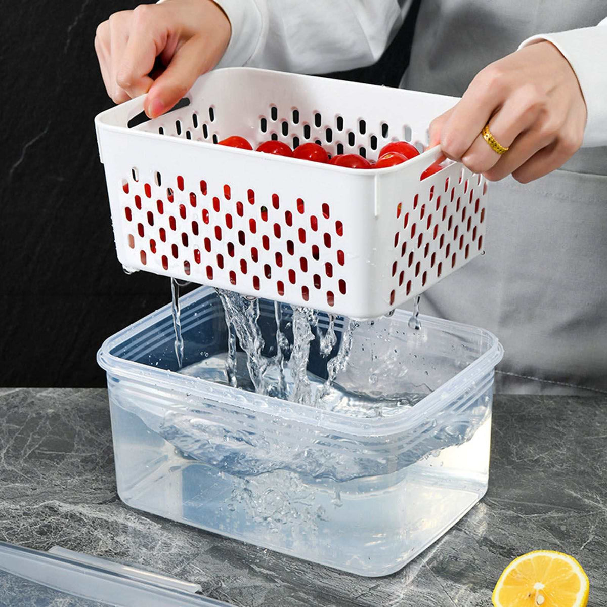 Drain Storage Basket Box with a white perforated basket of red tomatoes draining into a clear container