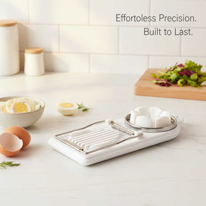 Egg Slicer Vertical Cut in white plastic with stainless steel wire blades and a round flower-cutting insert