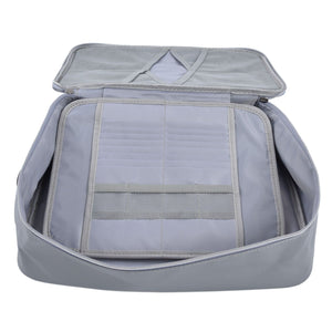 Fireproof Document Bag in silver-grey with a soft fabric exterior, opened to reveal a lined interior with mesh pockets