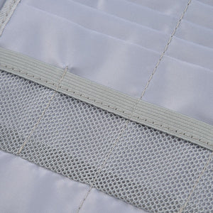 Fireproof Document Bag interior in silver with a stitched mesh pocket and smooth fabric lining