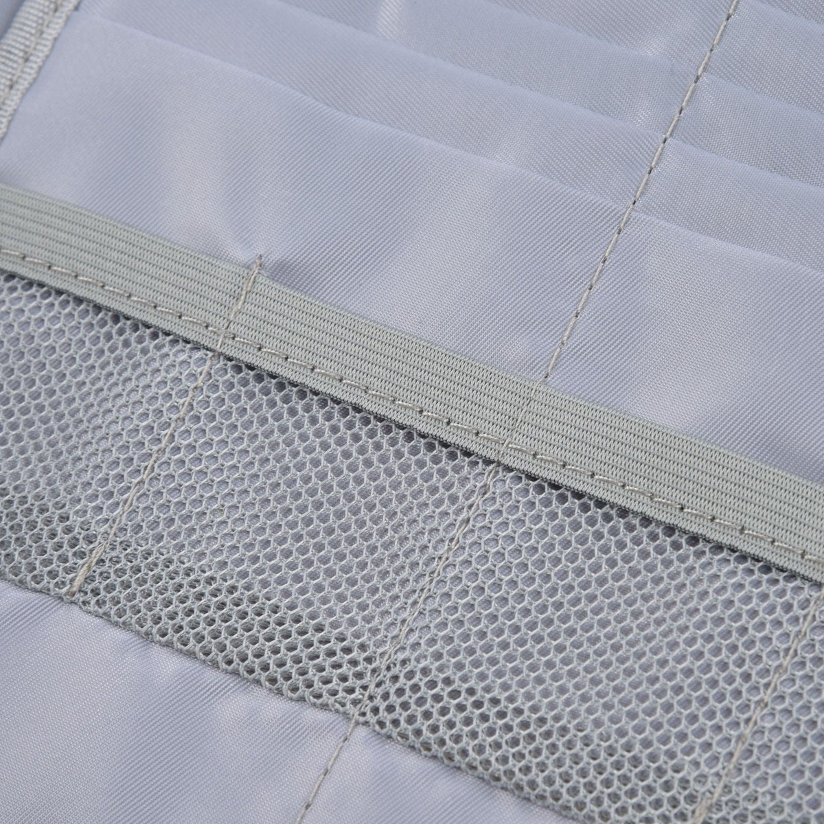Fireproof Document Bag interior in silver with a stitched mesh pocket and smooth fabric lining
