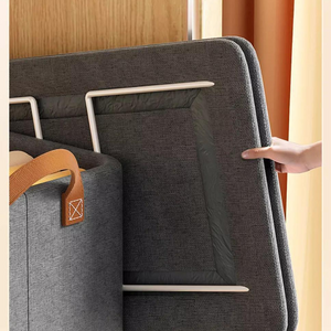 Foldable Fabric Storage Bin in charcoal gray woven fabric, showing its rigid metal frame and reinforced tan handle.
