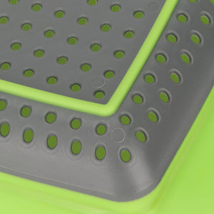 Folding Drain Basket with a grey perforated surface, bright green flexible edges and a lime green base