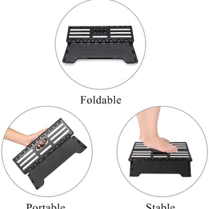 Folding Step Stool in black plastic with a textured anti-slip top, folding design, carry handle and stable base