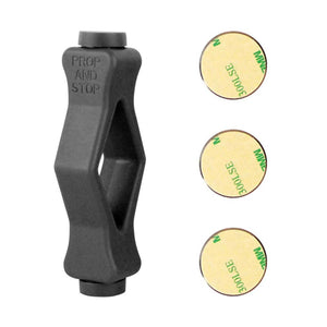 Front Load Washer Door Prop in dark grey molded material with an angular open center, alongside three round adhesive magnet stickers
