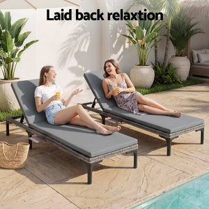 Gardeon 2PC Sun Lounger set with two grey PE rattan recliners, dark frames and full-length grey cushions