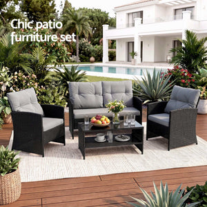 Gardeon 4-Piece Outdoor Sofa Set with black woven rattan chairs and loveseat, grey cushions and glass-top coffee table