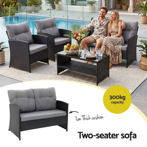 Gardeon 4-Piece Outdoor Sofa Set with black woven rattan seating, grey cushions and a glass-top coffee table