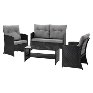 Gardeon 4-Piece Outdoor Sofa Set in black woven rattan with grey cushions, tufted back pillows and glass-top table