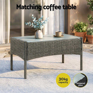 Gardeon 4-Piece Outdoor Sofa Set with a grey woven rattan coffee table and clear tempered glass top