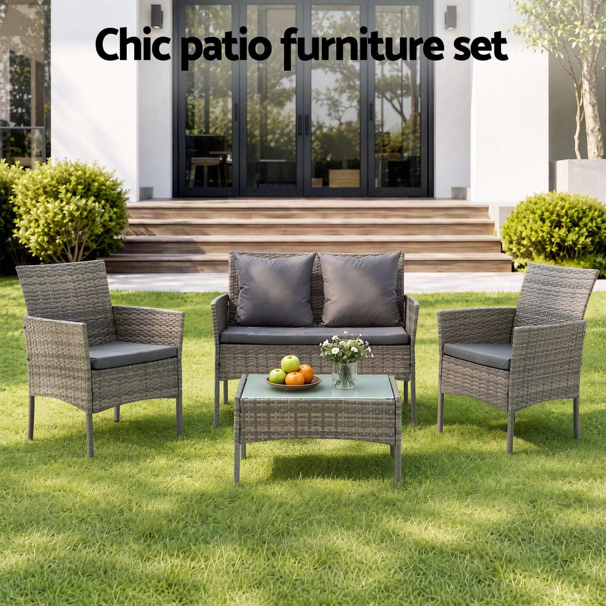 Gardeon 4-Piece Outdoor Sofa Set in mixed grey woven rattan, with grey cushions, two pillows and glass-top table