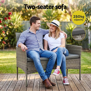 Gardeon 4-Piece Outdoor Sofa Set featuring a mixed grey woven rattan two-seater sofa with thick grey cushions