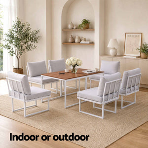 Gardeon 6 Seater Outdoor Dining set with white steel-frame sofas, pale cushions and two brown slatted tables