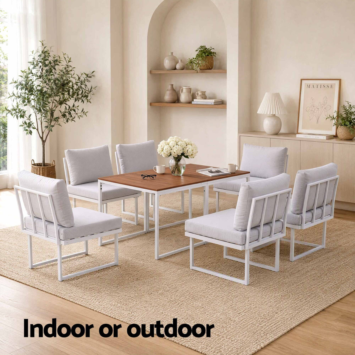 Gardeon 6 Seater Outdoor Dining set with white steel-frame sofas, pale cushions and two brown slatted tables