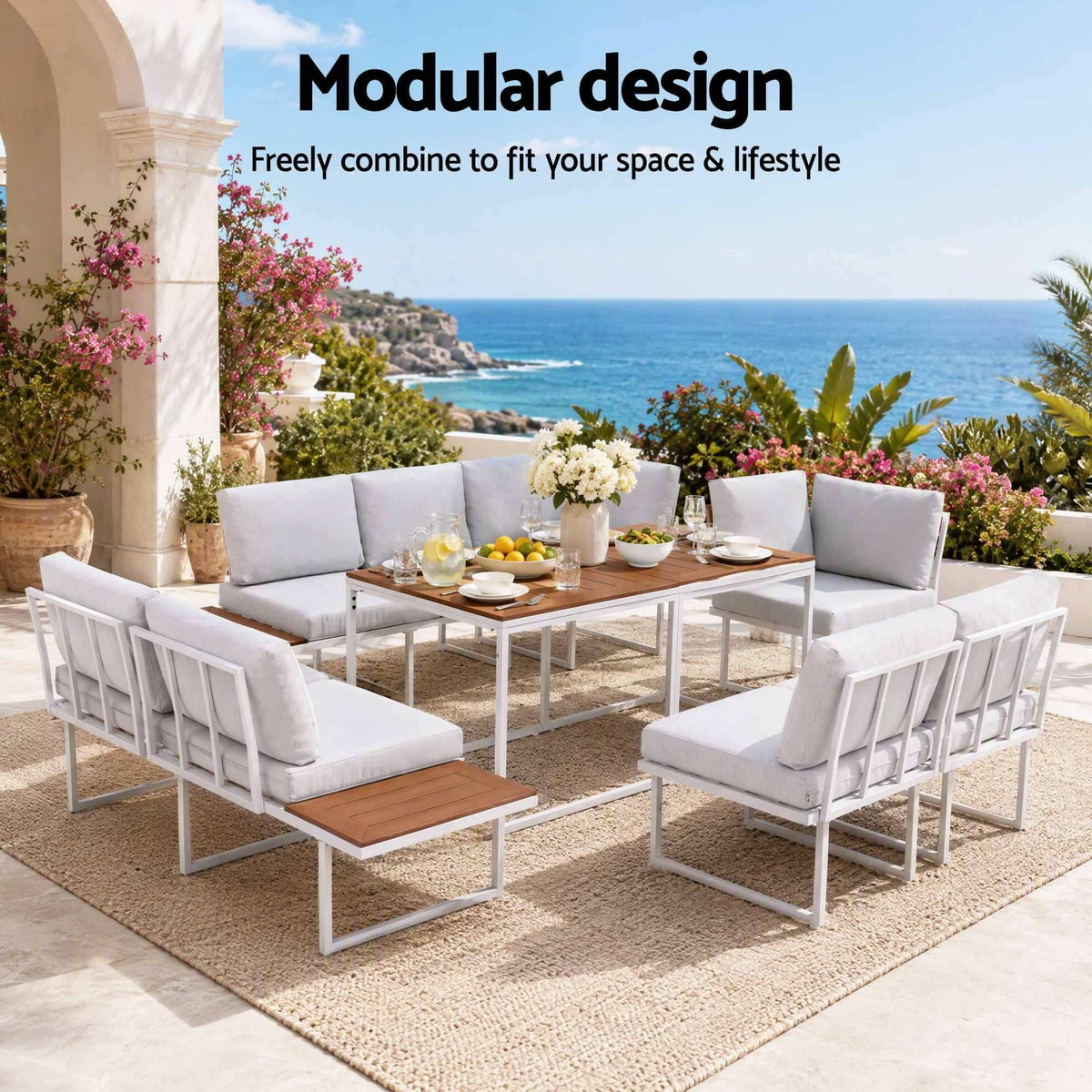 Gardeon 8 Seater Outdoor Dining Sofa Set with white cushioned modular seating, white frames and wood-look table tops