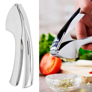 Garlic Press Zinc Alloy with a polished silver metal body, curved ergonomic handles and a perforated pressing chamber