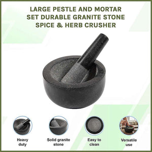 Granite Mortar & Pestle set in dark grey stone, with a rounded bowl and matching thick pestle for grinding herbs and spices.