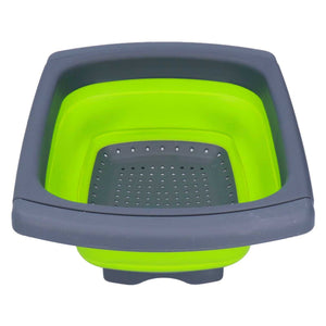 Green Foldable Drain Basket with bright green silicone sides, dark grey plastic rim and perforated base