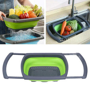 Green Foldable Drain Basket with a bright green collapsible silicone basin, dark gray plastic handles and perforated base