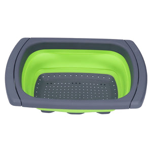 Green Foldable Drain Basket with bright green silicone sides, dark plastic rim and perforated draining base