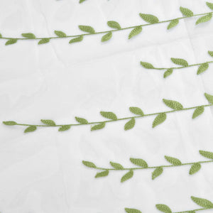 Sheer voile curtain featuring Green Willow Leaves in soft green embroidery on translucent white fabric.