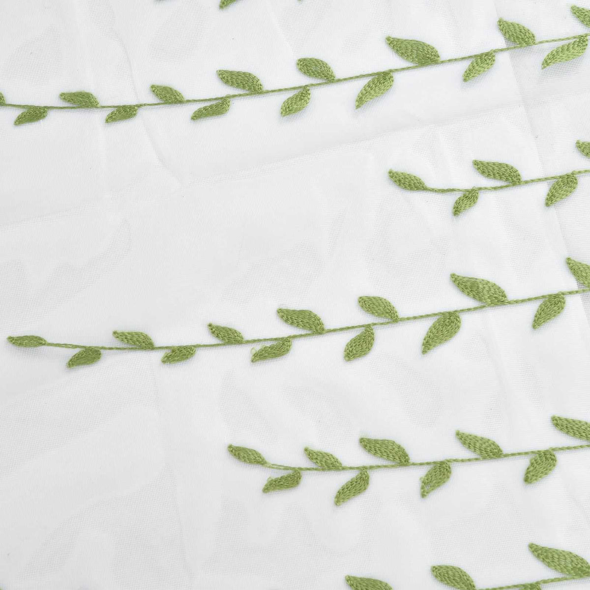 Sheer voile curtain featuring Green Willow Leaves in soft green embroidery on translucent white fabric.