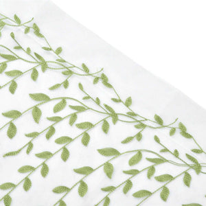 Sheer voile curtain with Green Willow Leaves in a light green botanical print on translucent white fabric.