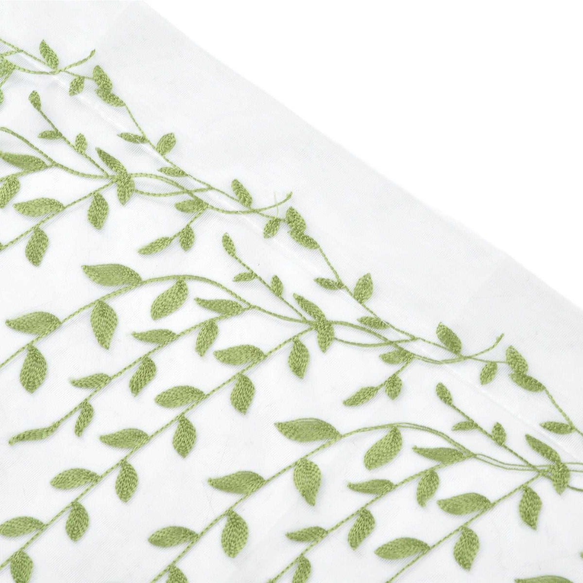 Sheer voile curtain with Green Willow Leaves in a light green botanical print on translucent white fabric.
