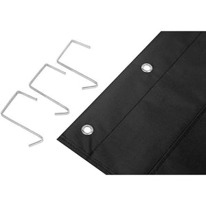 Hanging Wall Organiser in black Oxford cloth with reinforced seams and metal eyelets, shown with three silver wall hooks.