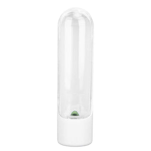 Herb Keeper Herb Storage Container in clear plastic with a white base and domed shell, holding a small green herb leaf