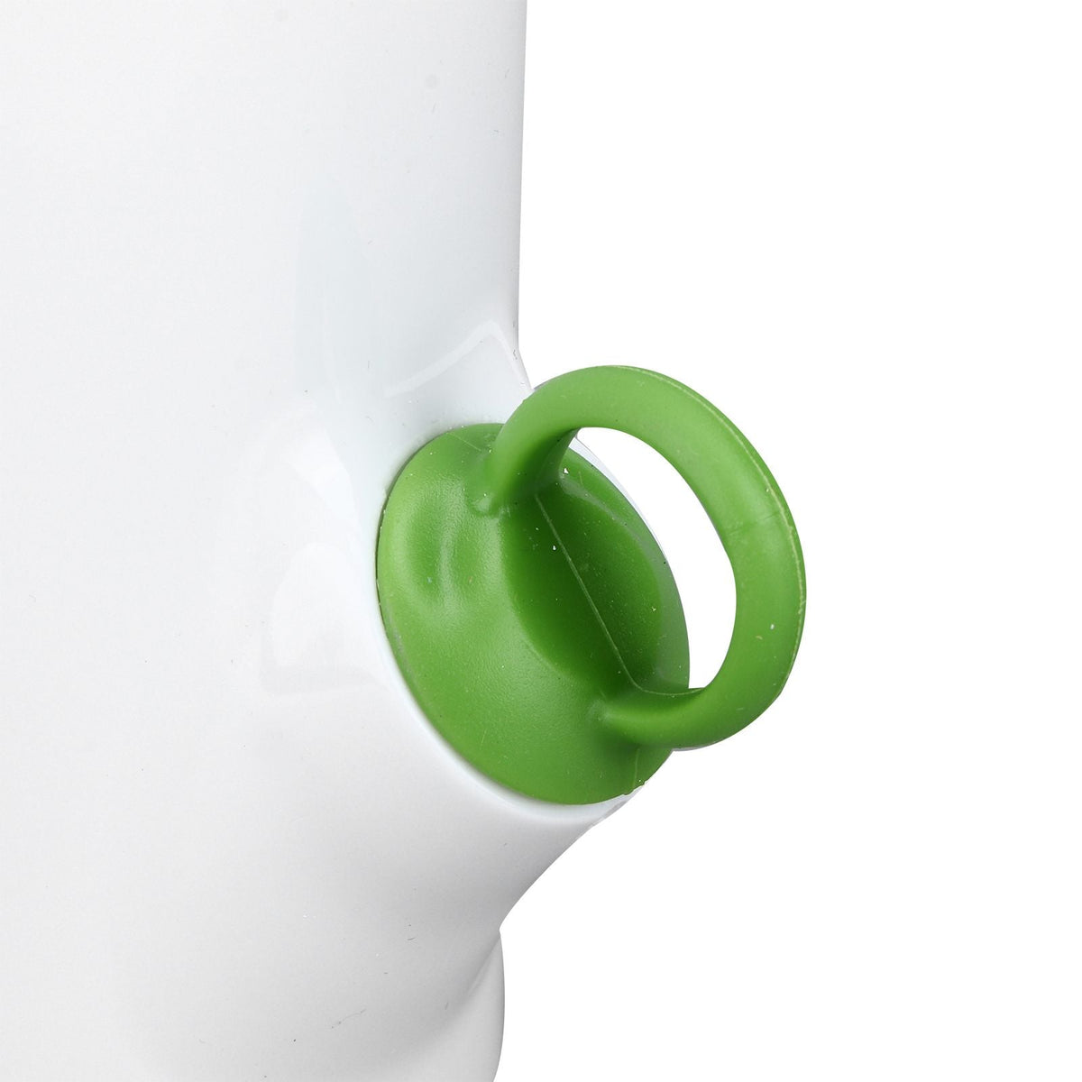 Herb Keeper Herb Storage Container with a bright green plastic loop handle attached to a smooth white body