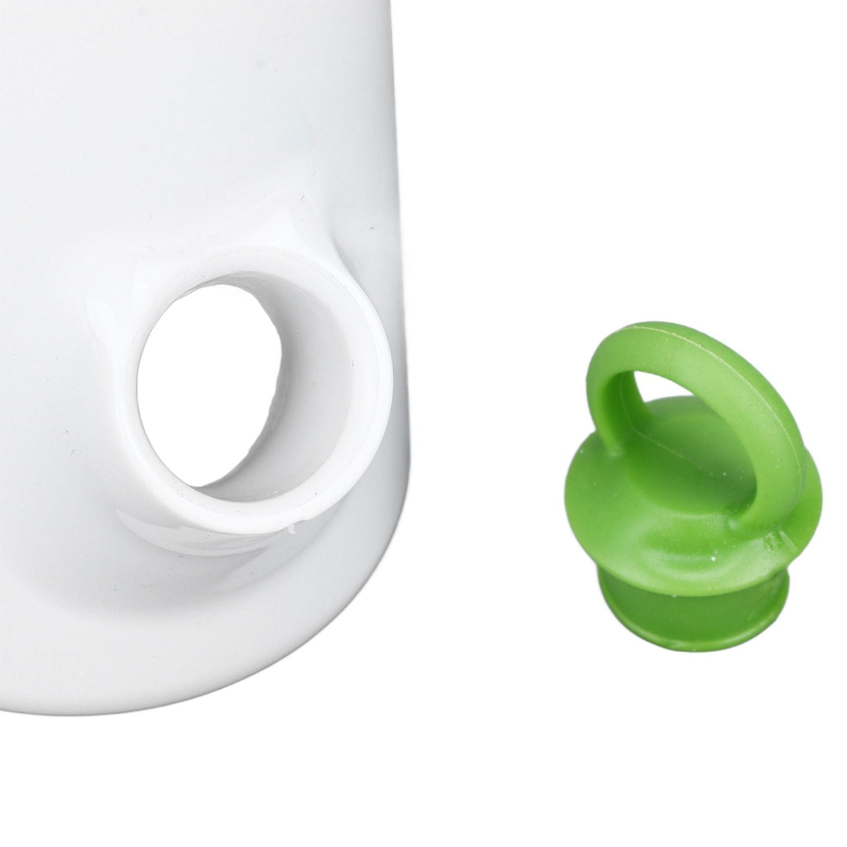 Herb Keeper Herb Storage Container in white plastic with a circular opening and separate green stopper