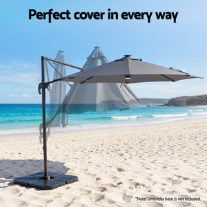 Instahut Outdoor Umbrella with a charcoal grey fabric canopy, black offset frame and cantilever design