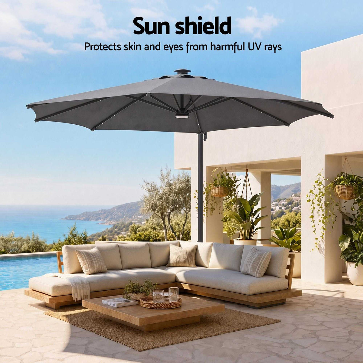 Instahut Outdoor Umbrella with a wide charcoal polyester canopy and black offset frame for UV shade