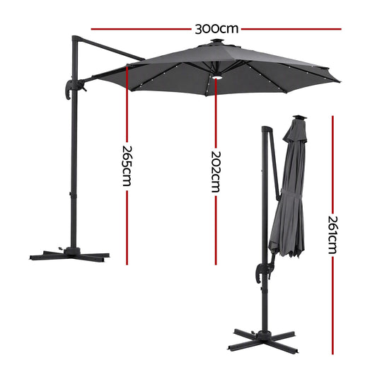 Instahut Outdoor Umbrella with charcoal polyester canopy, black offset frame and cross-shaped base, shown open and folded