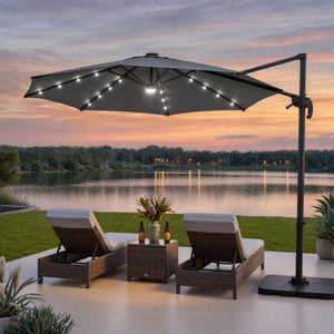 Instahut Outdoor Umbrella with charcoal canopy, black offset frame and illuminated solar LED lights along the ribs