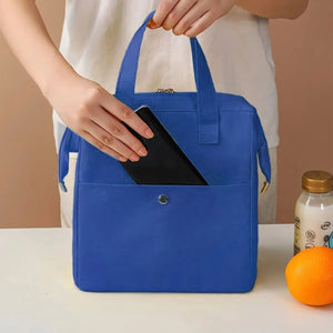 Insulated Lunch Bag in royal blue Oxford cloth, with dual handles, a front snap pocket and gold-tone zipper pulls