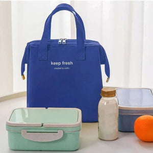 Insulated Lunch Bag in royal blue Oxford cloth with twin handles, silver two-way zipper and a front pocket