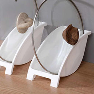 Japanese Kitchen Dish rack in white plastic, with angled plate slots holding upright round plates and bowls